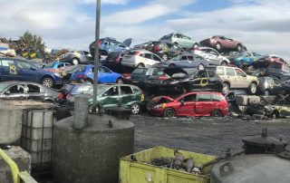 Large pile of scrap cars