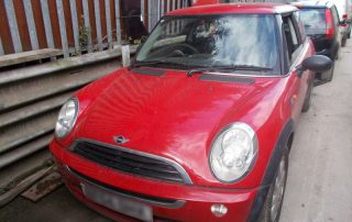 Red Mini Cooper scrap