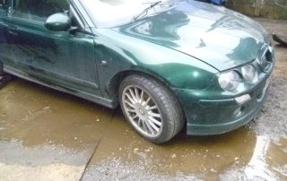 front-side view of scrap MG